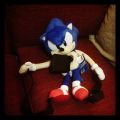 The plush Sonic "backpack" is incredibly small, as you can see my the fact that not even my phone would fit inside him.